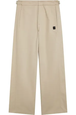AGNÈS B. Logo-patch wide-leg trousers