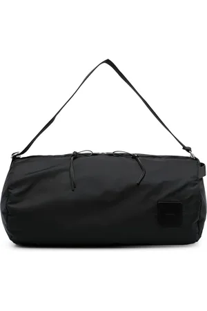 Jil Sander Logo-patch circular duffle bag