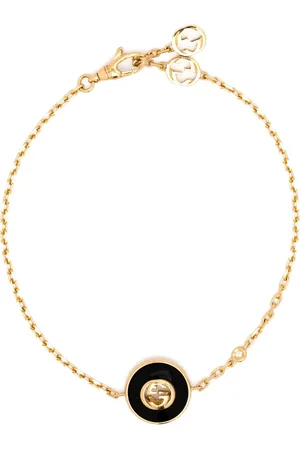Gucci 18kt yellow Interlocking G onyx and diamond bracelet