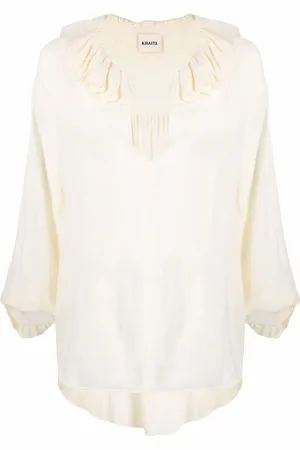 Khaite Ruffled neck blouse
