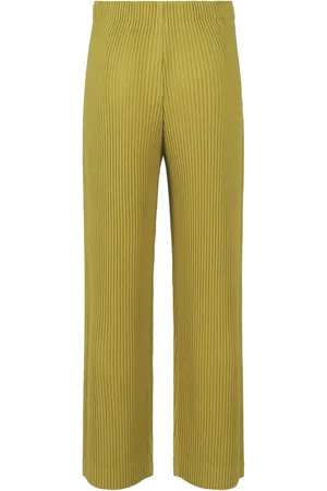 Issey Miyake Pliss??-effect tapered trousers