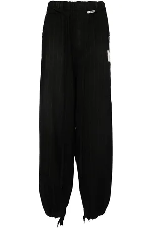 Maison Mihara Yasuhiro Pinstriped drawstring hem pants