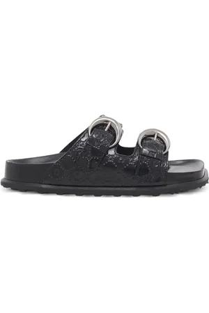 Marine Serre Monogram-embossed leather slides