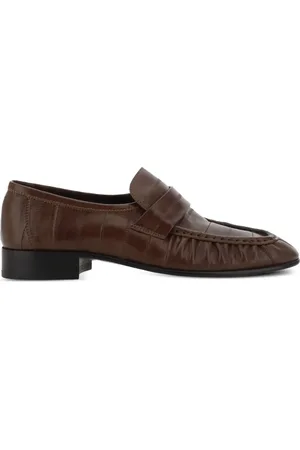 The Row Textured leather loafers