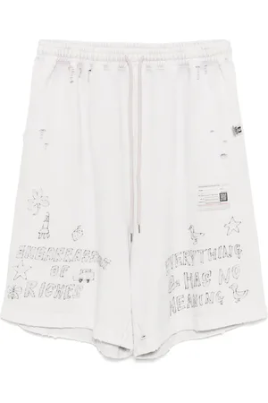 Maison Mihara Yasuhiro Bleached graffiti-print shorts