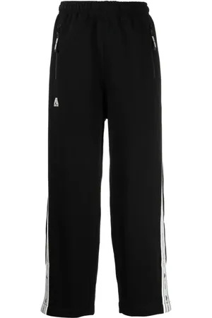 Izzue Logo-patch cotton-blend track pants