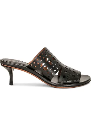 Alaïa Mule Sandal in - Black. Size 36 (also in 38, 39, 41).