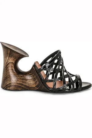 Alaïa Sculpture Mule Sandal in - Black. Size 36 (also in 37, 41).