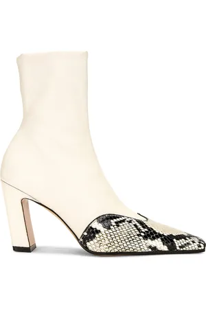 Khaite Nevada Ankle Stretch Boot in - Ivory. Size 36.5 (also in 37, 37.5, 38, 38.5, 40, 41).
