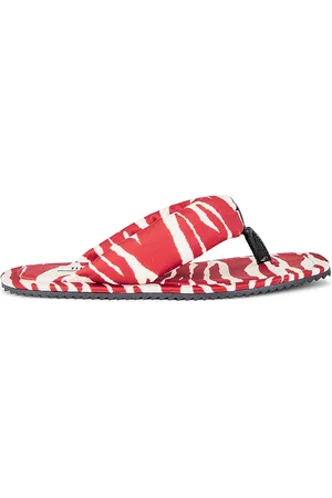 The Attico Zebra Printed Indie Flat Thong Sandal in - Red. Size 36 (also in ).
