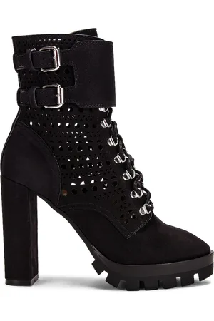 Alaïa Perforated Military Boots in - Black. Size 35.5 (also in 36, 36.5, 38.5, 39).