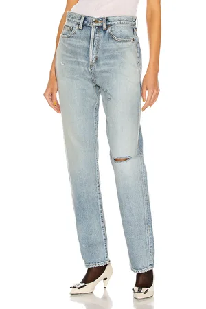 Saint Laurent Slim Fit Jean in - Denim-Light. Size 25 (also in 26, 27, 28).