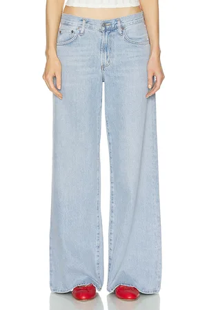 AGOLDE Clara Low Rise Baggy Flare in - Denim-Light. Size 32 (also in 33).