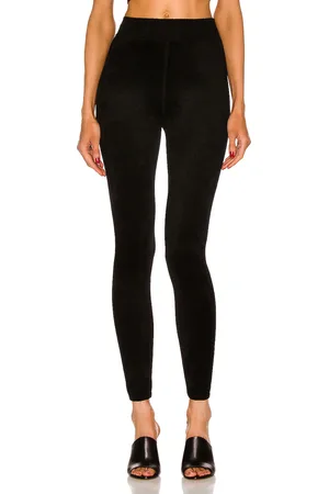Alaïa High Waisted Legging in - Black. Size 42 (also in ).
