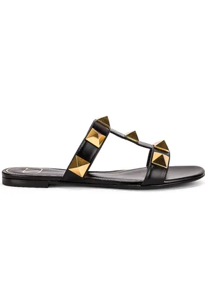 VALENTINO GARAVANI Roman Stud Slides in - Black. Size 36 (also in 36.5, 38, 38.5, 39, 39.5, 41).