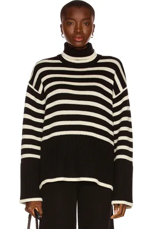 Totême Signature Stripe Turtleneck Sweater in - Black. Size L (also in M, S, XS).