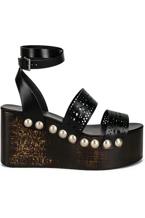 Alaïa Vienne Wooden Ankle Strap Wedges in - Black. Size 38 (also in 39, 40, 41).