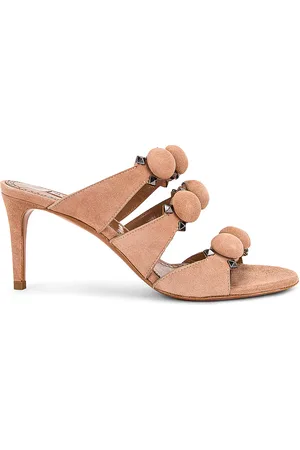 Alaïa Pom Pom Studded Mules in - Beige. Size 39.5 (also in ).