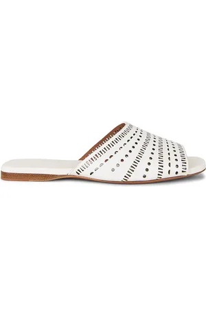Alaïa Vienne Leather Slides in - White. Size 36 (also in 37, 40).