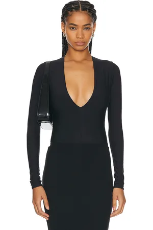 ÉTERNE Long Sleeve Deep V Bodysuit in - . Size L (also in ).