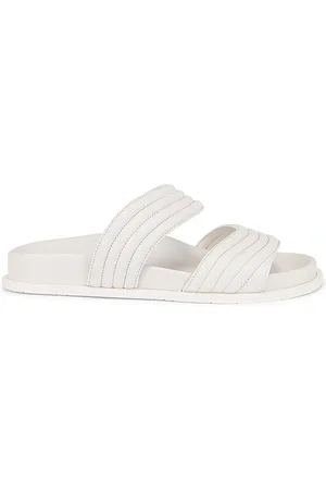 Alaïa Leather Slides in - White. Size 36 (also in 37, 40).