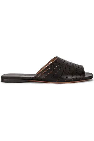 Alaïa Vienne Leather Slides in - Black. Size 36 (also in 36.5).