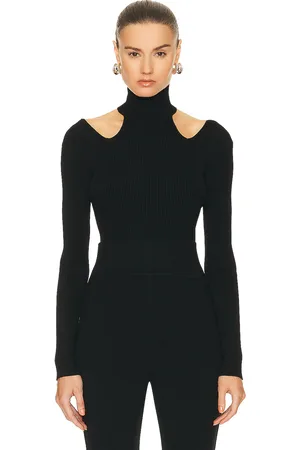 Alaïa Cut Out Bodysuit Top in Noir in - Black. Size 42 (also in ).