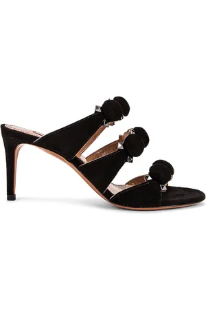 Alaïa Pom Pom Studded Mules in - Black. Size 37 (also in 39, 40).
