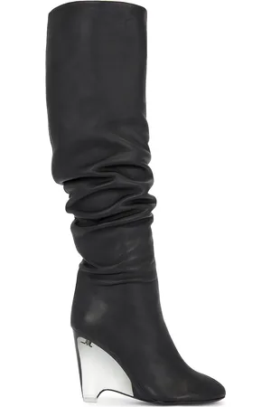 Alaïa Wedge Boots 100 in - Black. Size 38 (also in ).