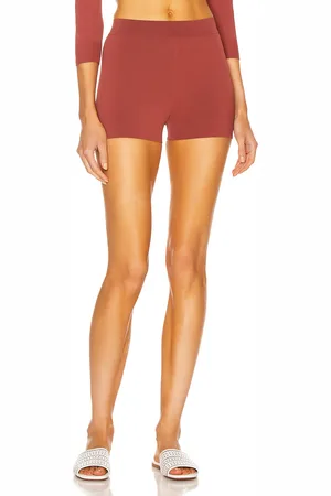 Alaïa Biker Short in - Rust. Size 42 (also in ).