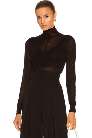 Alaïa Long Sleeve Roll Neck Sweater in - Black. Size 42 (also in ).