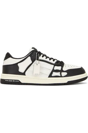 AMIRI Skel Top Low Sneaker in - Black. Size 40 (also in 41, 42, 43, 44, 45, 47, 48).