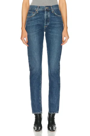 AGOLDE Austin Mid Rise Tapered Slim in - Denim-Medium. Size 23 (also in 24, 29, 30, 31, 32, 33, 34).