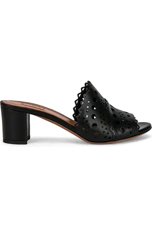 Alaïa Vienne Mules in - Black. Size 36 (also in 36.5, 38).