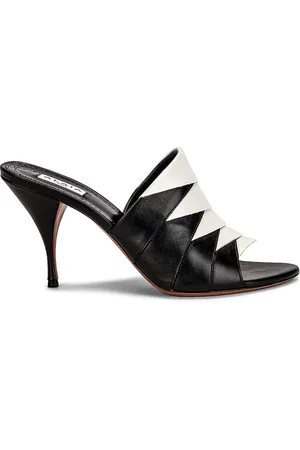 Alaïa Leather Mules in - Black. Size 36 (also in 36.5, 37, 38.5, 39.5, 40).