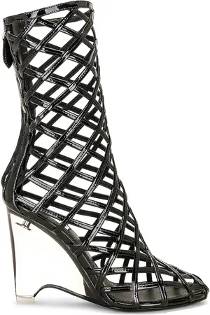 Alaïa Wedge Boot in - Black. Size 36 (also in ).