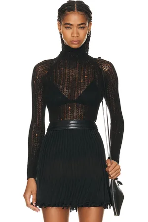 Alaïa High Neck Top in - Black. Size 42 (also in ).
