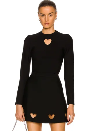 Alaïa Cutout Heart Long Sleeve Top in - Black. Size 34 (also in ).