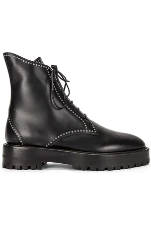 Alaïa Leather Micro Oeillets Boots in - Black. Size 36 (also in 38.5).