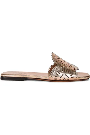 Alaïa Perforated Molukai Mules in - Metallic Gold. Size 36 (also in 36.5).