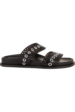 Alaïa Perforated Eyelet Slides in - Black. Size 36 (also in 36.5, 41).