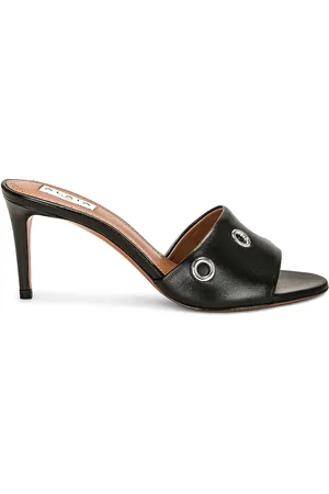 Alaïa Eyelet Mule in - Black. Size 37.5 (also in 38, 39, 40).