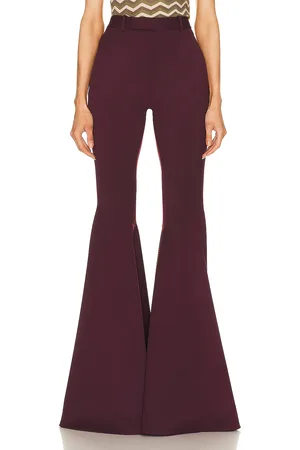 Saint Laurent Flare Trouser in - Wine. Size 34 (also in 36).