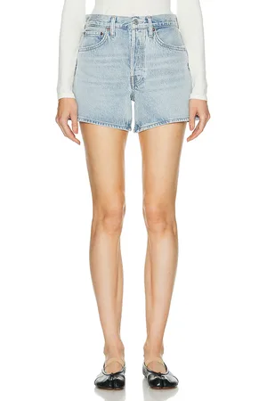AGOLDE Parker Long Short in - Denim-Light. Size 23 (also in 24, 31, 32, 33, 34).