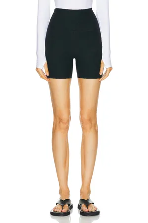 Beyond Yoga Keep Pace Biker Short in - Black. Size L (also in M, S, XL, XS).