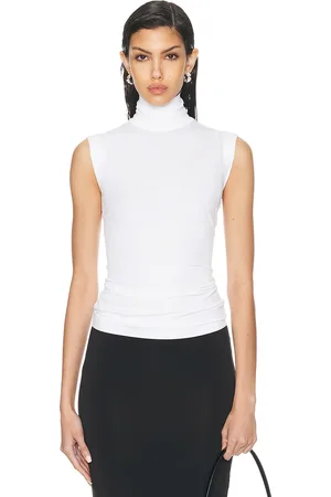 Norma Kamali Slim Fit Sleeveless Turtle Top in - White. Size XS (also in ).