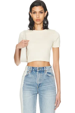 Flore Flore Car Crop Top in - Cream. Size L (also in ).
