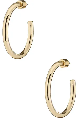 Jennifer Fisher Walk Huggie Earrings in - Metallic Gold. Size all.