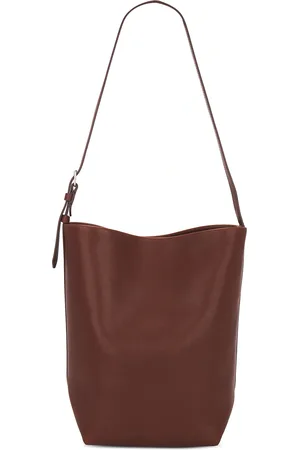 The Row Medium Park Tote Belt in - Burgundy. Size all.