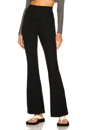 Beyond Yoga Spacedye All Day Flare High Waisted Pant in - Black. Size XS (also in ).